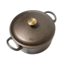Overhead view of a handcrafted Amish-made cast iron Dutch oven with bronze knob, featuring embossed lettering and designed for Farm, Garden & Tool, Kitchen & Food, Camping, Cookware, Cast Iron, USA Made, and Best Sellers collections.