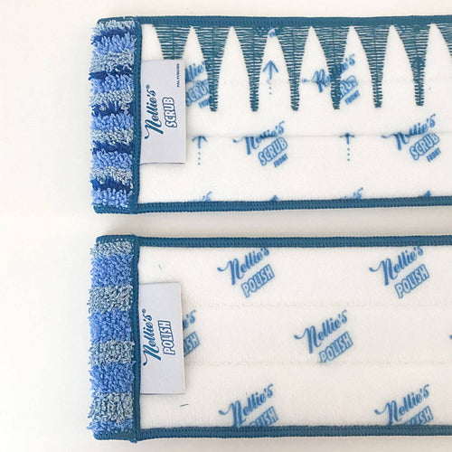 Two microfiber cleaning pads with one labeled for scrubbing and the other for polishing, featuring textured blue edges, designed for household cleaning and best sellers collections.