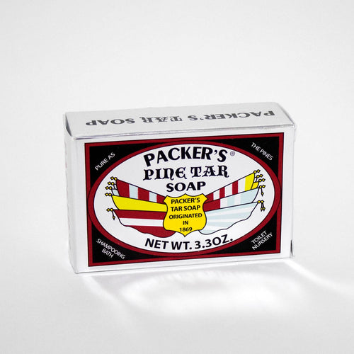 Single bar of Packer's Pine Tar soap in rectangular packaging with bold black and red label, made in USA, featured in Health & Wellness and Grooming collections.