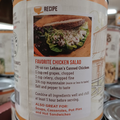 Close-up of a recipe label for a favorite chicken salad using canned chicken, grapes, celery, mayonnaise, and seasonings, shown with a sandwich on lettuce and grapes, highlighting a quick meal idea for Kitchen & Food, Food, Meats, Best Sellers, and Promo Eligible collections.