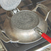 Stovetop iron with aluminum base and red wooden handle, featuring detailed patterned plates for making traditional cookies, crafted in USA for Kitchen & Food and Baking Supplies collections.