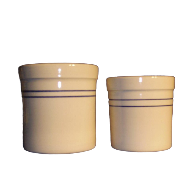 Handcrafted stoneware crocks in natural clay with heritage blue stripes, perfect for food preservation, kitchen decor, and fermenting, made in the USA for home use.