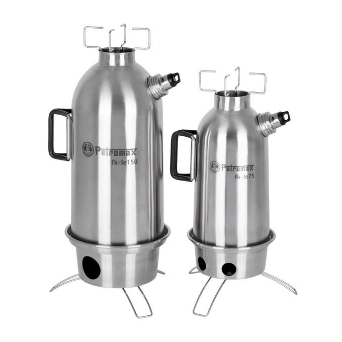 Two handcrafted stainless steel kettles with sturdy handles and screw-on spouts, each on foldable stove bases with ventilation holes, ideal for Farm, Garden & Tool, Camping, Emergency Supplies, and Best Sellers collections.
