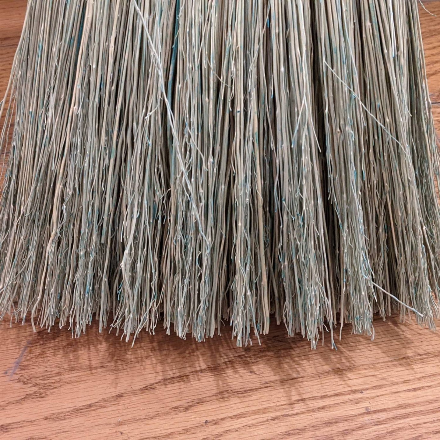 Close-up of finely bound corn straw broom bristles handcrafted in the USA, ideal for children’s play or light sweeping, featured in Home & Decor and Cleaning Utensils collections.