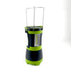 Portable black and green LED lantern with foldable metal handles, designed for versatile illumination in camping, emergency supplies, and outdoor lighting collections.