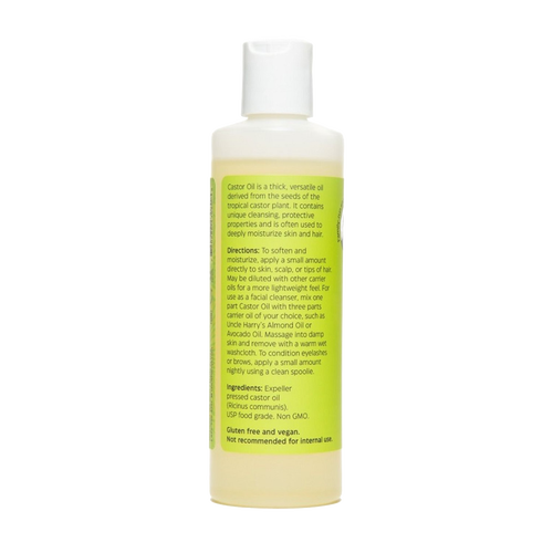Bottle of Uncle Harry’s Castor Oil for Moisturizing with detailed label instructions, highlighting natural expeller pressed oil, gluten-free and vegan, part of Health & Wellness and USA Made collections.