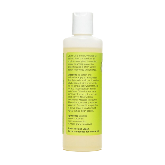Bottle of Uncle Harry’s Castor Oil for Moisturizing with detailed label instructions, highlighting natural expeller pressed oil, gluten-free and vegan, part of Health & Wellness and USA Made collections.