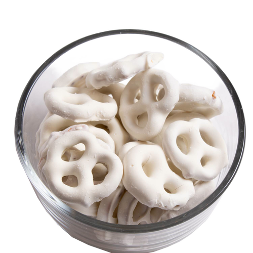 Clear glass bowl filled with handcrafted mini pretzels coated in creamy white chocolate, a USA made snack perfect for Kitchen & Food, Snacks and Sweets, Candy, Best Sellers, and Promo Eligible collections.