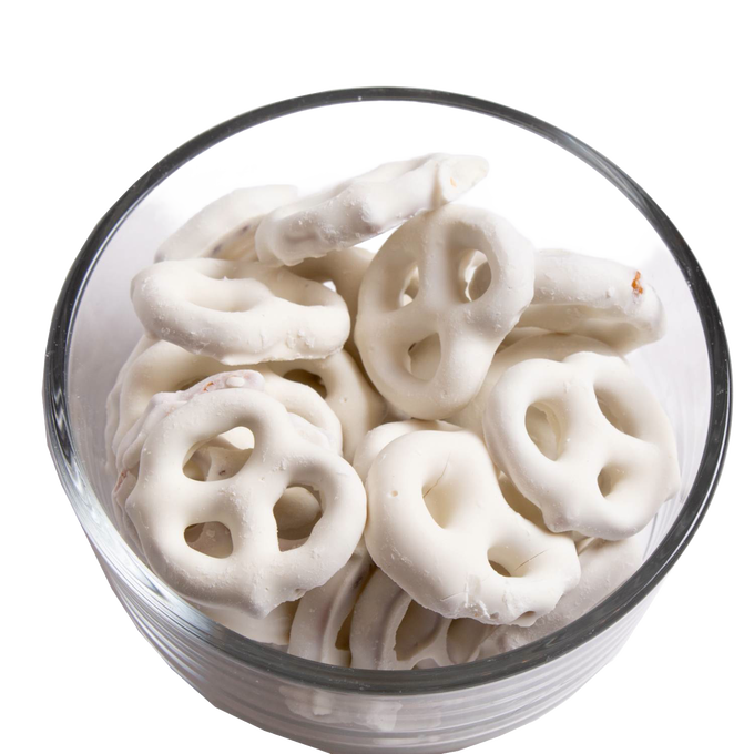 Clear glass bowl filled with handcrafted mini pretzels coated in creamy white chocolate, a USA made snack perfect for Kitchen & Food, Snacks and Sweets, Candy, Best Sellers, and Promo Eligible collections.