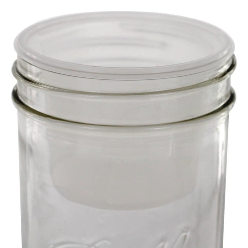 Clear plastic divider cup designed to fit inside wide-mouth jars, creating two compartments for organized food storage, ideal for Kitchen & Food and USA Made collections.