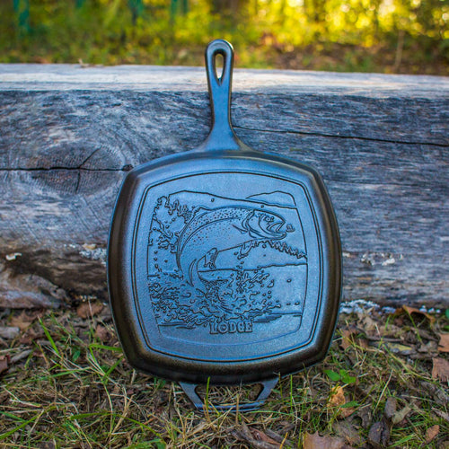 Handcrafted cast iron grill pan with a detailed trout design on the cooking surface, made in USA, ideal for Kitchen & Food, Cast Iron, Grilling, and Best Sellers collections.