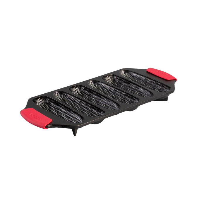 Seasoned cast iron cornstick pan with dual silicone handles and angled feet for stability, designed for Kitchen & Food, Cast Iron, USA Made, Best Sellers, and Cookware collections.