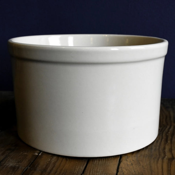 Simple white stoneware utility crock with smooth finish, handcrafted for kitchen use and food preservation, ideal for fermenting and pickling, featured in best sellers collections.