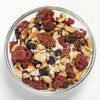 Clear glass bowl filled with a protein-rich snack mix of roasted black walnuts, dried cherries, cranberries, blueberries, and shredded coconut, perfect for Kitchen & Food, Snacks and Sweets, Pantry, USA Made, and Best Sellers collections.