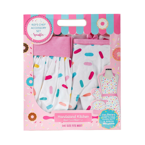 Child-sized chef accessory set with a white apron, oven mitt, and hat decorated with colorful sprinkle patterns, packaged in a playful pink box for Kitchen & Food, Children's Toys, and Arts and Crafts collections.
