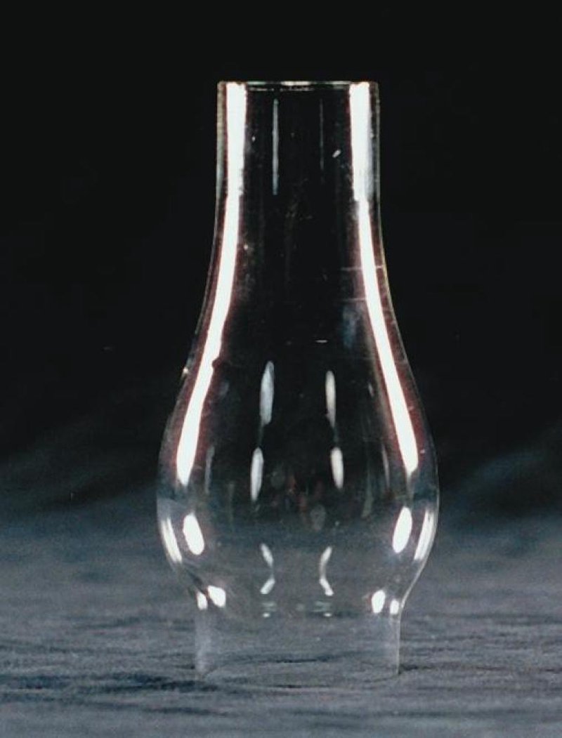 Clear glass oil lamp chimney with a 1 5/8 inch base and curved bulge, part of Lamps & Lighting, Parts and Accessories, Chimneys and Globes, Best Sellers, and Promo Eligible collections.