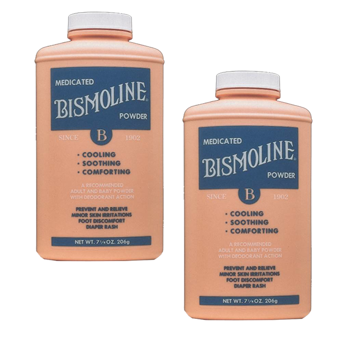 Two bottles of medicated powder in peach-colored containers with blue labels, designed to soothe and prevent skin irritation, part of Health & Wellness and USA Made collections.