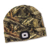 Camo patterned beanie with integrated rechargeable LED light on the cuff, designed for hands-free visibility during outdoor activities like camping and hunting.