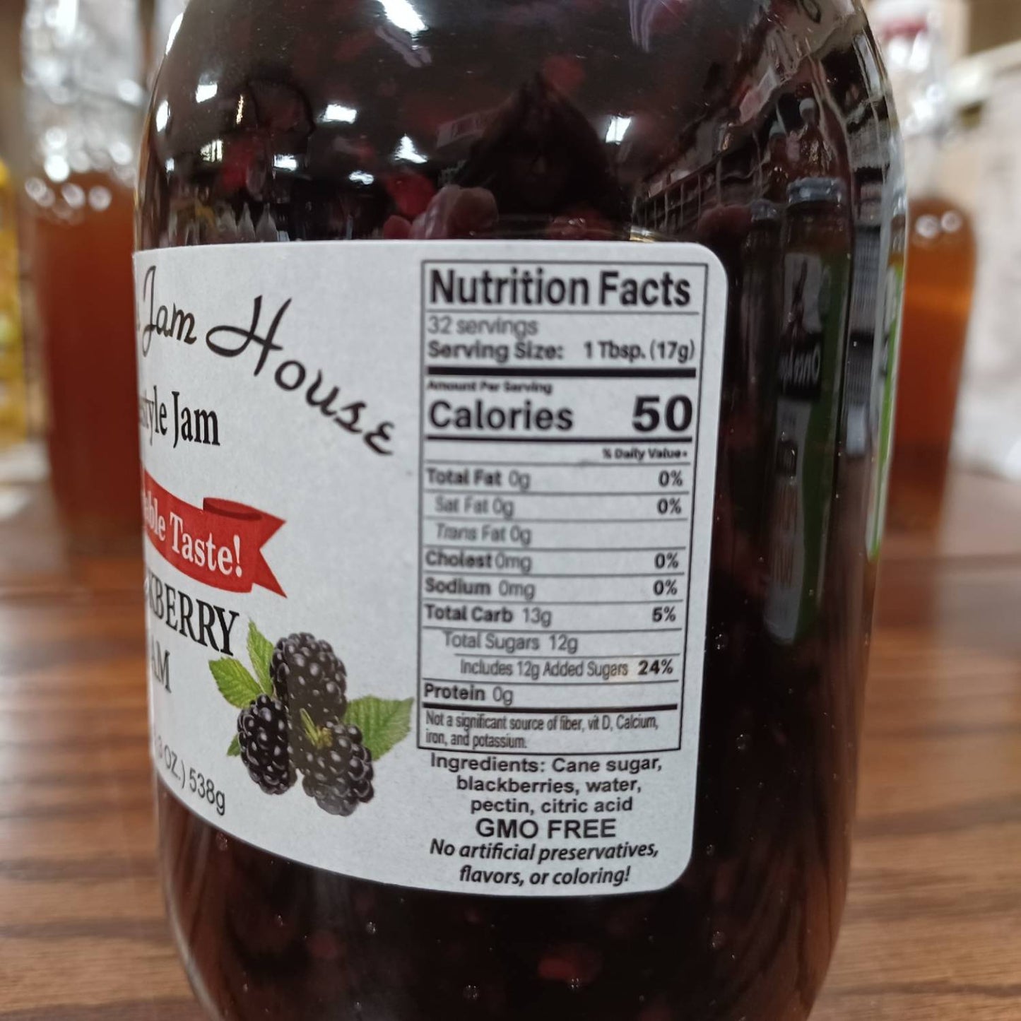Close-up of a handcrafted blackberry jam jar label showing nutrition facts and simple ingredients, featured in Kitchen & Food, Pantry, Peanut Butter & Jellies, USA Made, Best Sellers, and Promo Eligible collections.