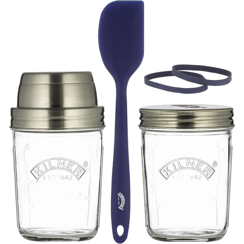 Handcrafted Kilner glass jars with stainless steel lids and bands, accompanied by a blue silicone spatula, ideal for baking and food storage in Kitchen & Food and Baking Supplies collections.