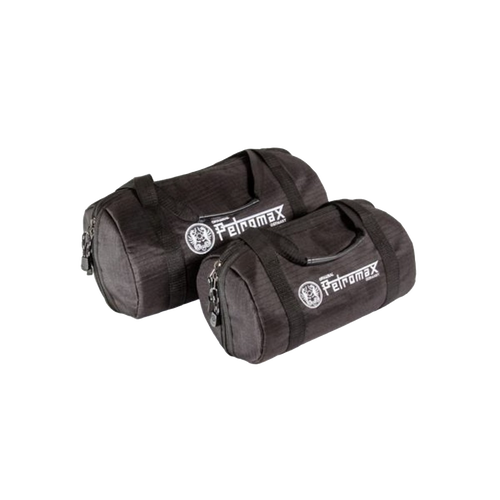 Two black ripstop fabric transport bags with sturdy handles and zippered closures, designed for protecting cookware, featured in Kitchen & Food, Cast Iron, and Best Sellers collections.