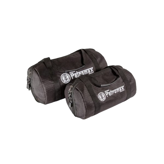 Two black ripstop fabric transport bags with sturdy handles and zippered closures, designed for protecting cookware, featured in Kitchen & Food, Cast Iron, and Best Sellers collections.