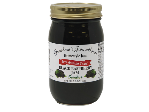 Handcrafted jar of seedless black raspberry homestyle jam with gold lid and white label featuring fruit illustrations, made in USA, ideal for Kitchen & Food, Pantry, Peanut Butter & Jellies, Best Sellers, and Promo Eligible collections.
