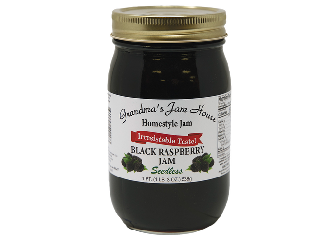 Handcrafted jar of seedless black raspberry homestyle jam with gold lid and white label featuring fruit illustrations, made in USA, ideal for Kitchen & Food, Pantry, Peanut Butter & Jellies, Best Sellers, and Promo Eligible collections.