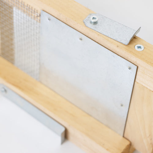 Close-up of a handcrafted wooden robbing screen with metal mesh and adjustable metal latches, designed to protect hives from robber bees, made in the USA, featured in Farm, Garden & Tool and Beekeeping Supplies collections.