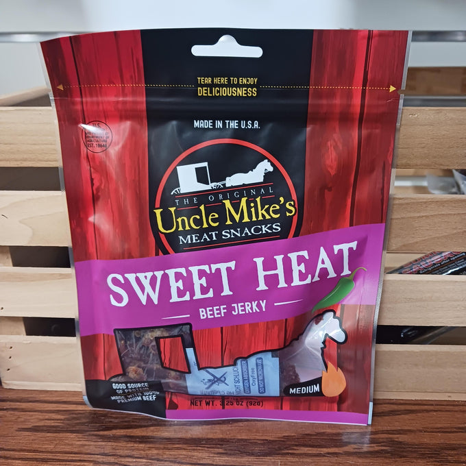 Handcrafted beef jerky with sweet and spicy flavor, made in the USA, featuring a resealable pouch; perfect snack for Kitchen & Food, Meats, and Best Sellers collections.