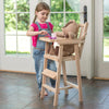 Child playing with a handcrafted Amish-made wooden doll high chair, feeding a stuffed bear, showcasing unique quality in Toys, USA Made, Children's Toys, and Best Sellers collections.