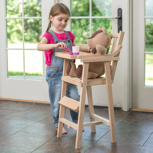 Child playing with a handcrafted Amish-made wooden doll high chair, feeding a stuffed bear, showcasing unique quality in Toys, USA Made, Children's Toys, and Best Sellers collections.