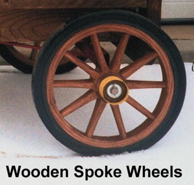 Close-up of a handcrafted wooden spoke wheel with solid rubber tire, part of specialty equipment and kitchen & food collections for making ice cream.