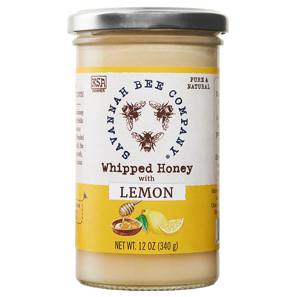 Handcrafted lemon-flavored whipped honey in a glass jar with a silver lid, featuring natural and pure ingredients, ideal for Kitchen & Food, Pantry, and Best Sellers collections.