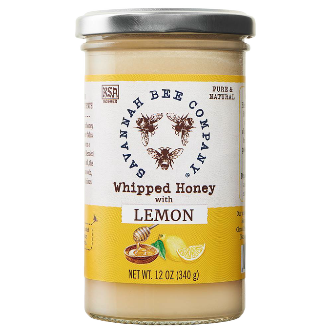 Handcrafted lemon-flavored whipped honey in a glass jar with a silver lid, featuring natural and pure ingredients, ideal for Kitchen & Food, Pantry, and Best Sellers collections.