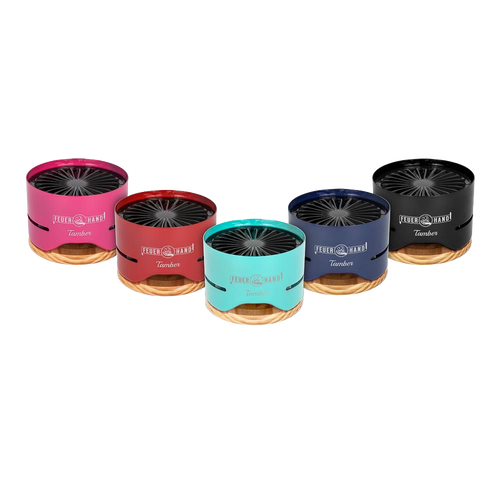 Row of five compact tabletop charcoal grills in pink, red, turquoise, blue, and black finishes with wooden bases, designed for small outdoor cooking, featured in Farm, Garden & Tool and Grilling collections.