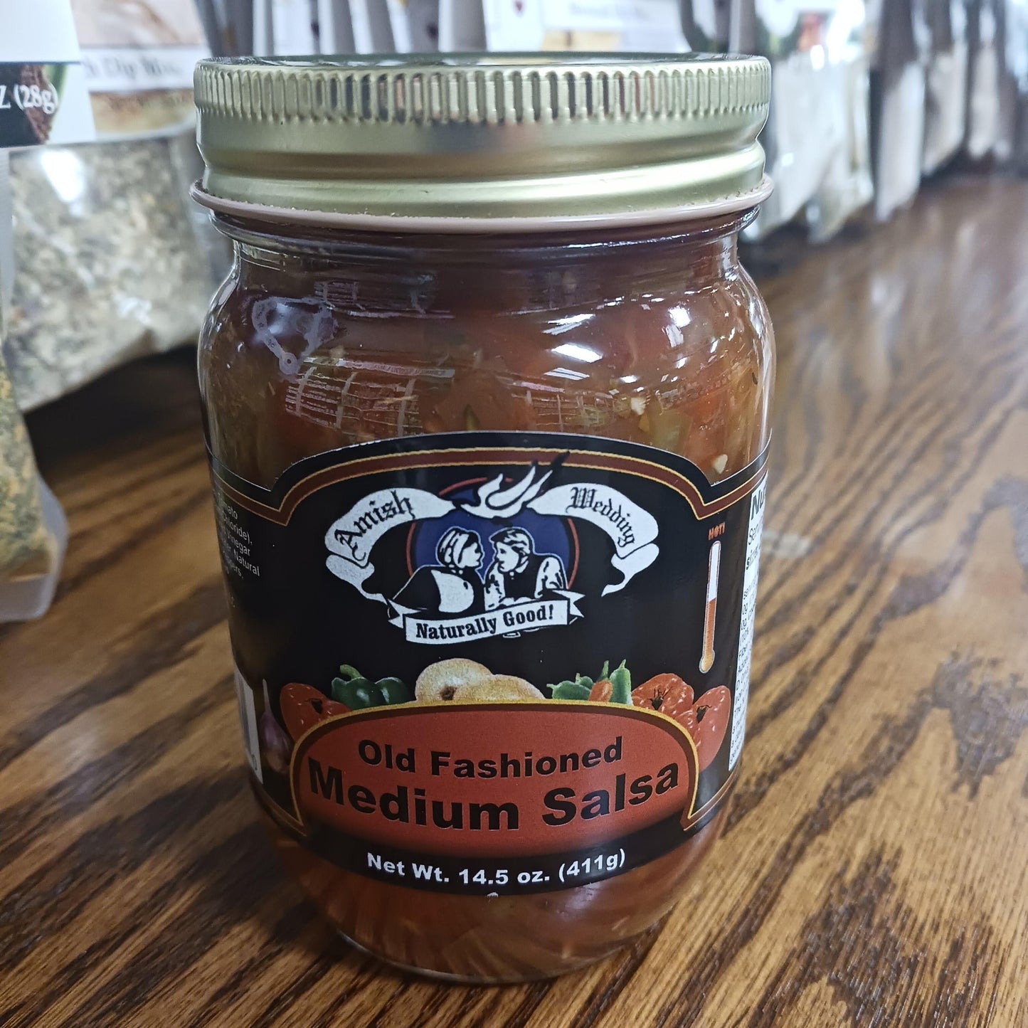 Handcrafted jar of Amish-style medium salsa with thick, chunky texture, made in USA, perfect for Kitchen & Food, Snacks and Sweets, Pantry, USA Made, Best Sellers, and Promo Eligible collections.