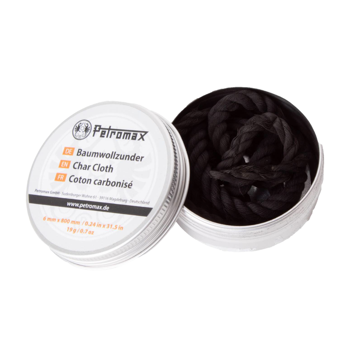 Open metal tin containing tightly woven black char cloth strips, designed for fire-starting, suitable for Farm, Garden & Tool, Camping, Best Sellers, and Promo Eligible collections.