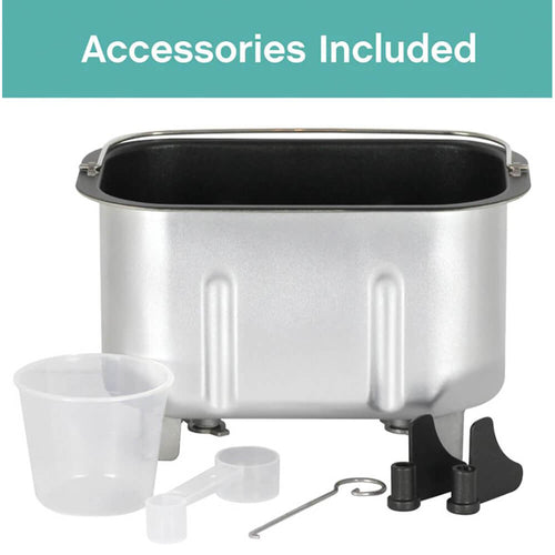 Silver bread maker pan with nonstick interior alongside clear measuring cup, plastic measuring spoon, kneading blade, and metal hook for bread making supplies in kitchen gadget collections