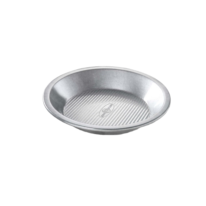 9-inch aluminized steel pie pan with fluted surface for even baking and easy release, made in USA, perfect for Kitchen & Food, Baking Supplies, and Cookware collections.