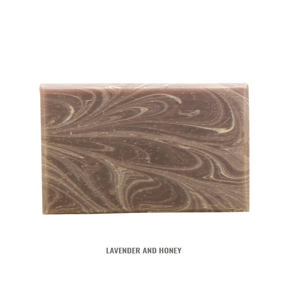 Handcrafted rectangular soap bar with swirling lavender and honey tones, naturally made in the USA, featured in Health & Wellness, Grooming and Personal Hygiene, Soaps collections.