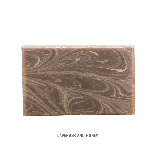Handcrafted rectangular soap bar with swirling lavender and honey tones, naturally made in the USA, featured in Health & Wellness, Grooming and Personal Hygiene, Soaps collections.