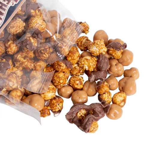 Clear bag spilling handcrafted caramel popcorn with assorted chocolate-coated pieces, a unique Amish-made sweet and crunchy treat featured in Kitchen & Food, Snacks and Sweets, Popcorn, USA Made, and Best Sellers collections.