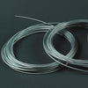 Two coils of durable 19-strand galvanized wire cable with silver vinyl coating, designed for long-lasting use in home decor, laundry supplies, and clothesline accessories.