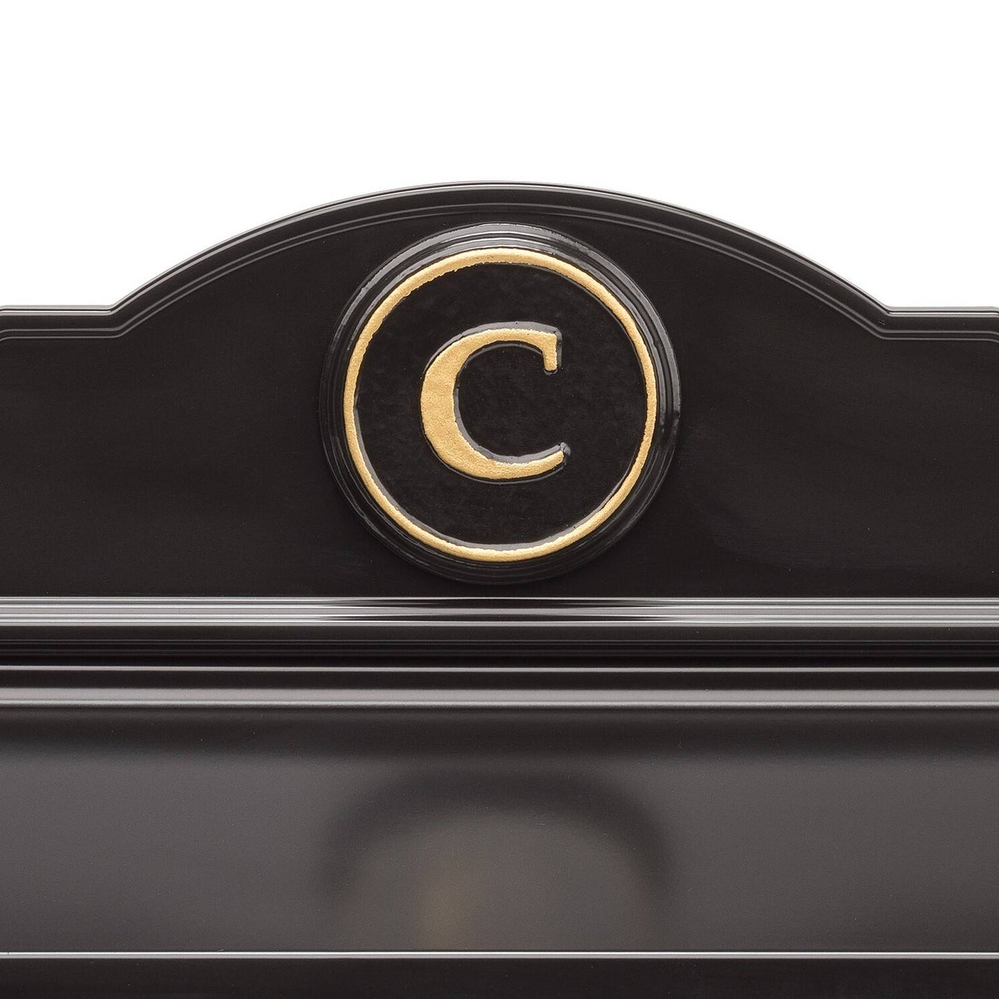 Close-up of a handcrafted black and gold personalized monogram detail on a custom wall mount mailbox, part of Home & Decor, Mailboxes and Address Signs, and USA Made collections.