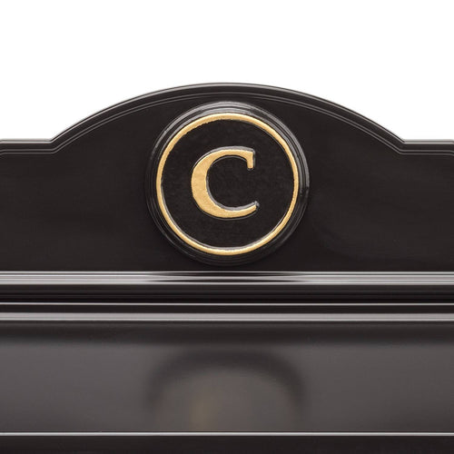 Close-up of a handcrafted black and gold personalized monogram detail on a custom wall mount mailbox, part of Home & Decor, Mailboxes and Address Signs, and USA Made collections.