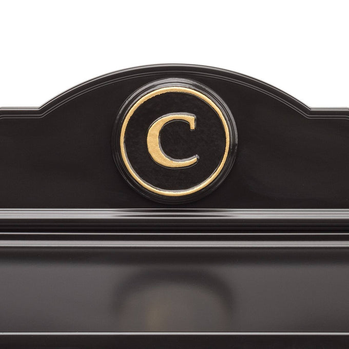 Close-up of a handcrafted black and gold personalized monogram detail on a custom wall mount mailbox, part of Home & Decor, Mailboxes and Address Signs, and USA Made collections.