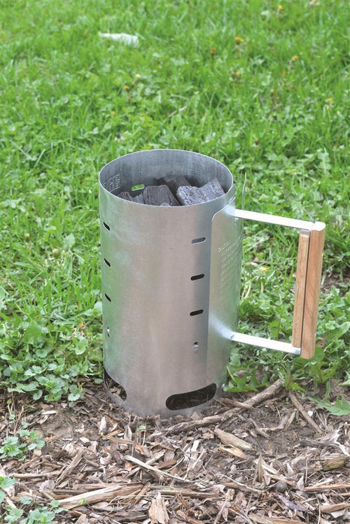 Aluminized steel charcoal starter with wooden handle filled with briquets, designed for quick charcoal ignition, ideal for camping, farm, garden, and outdoor tool collections.