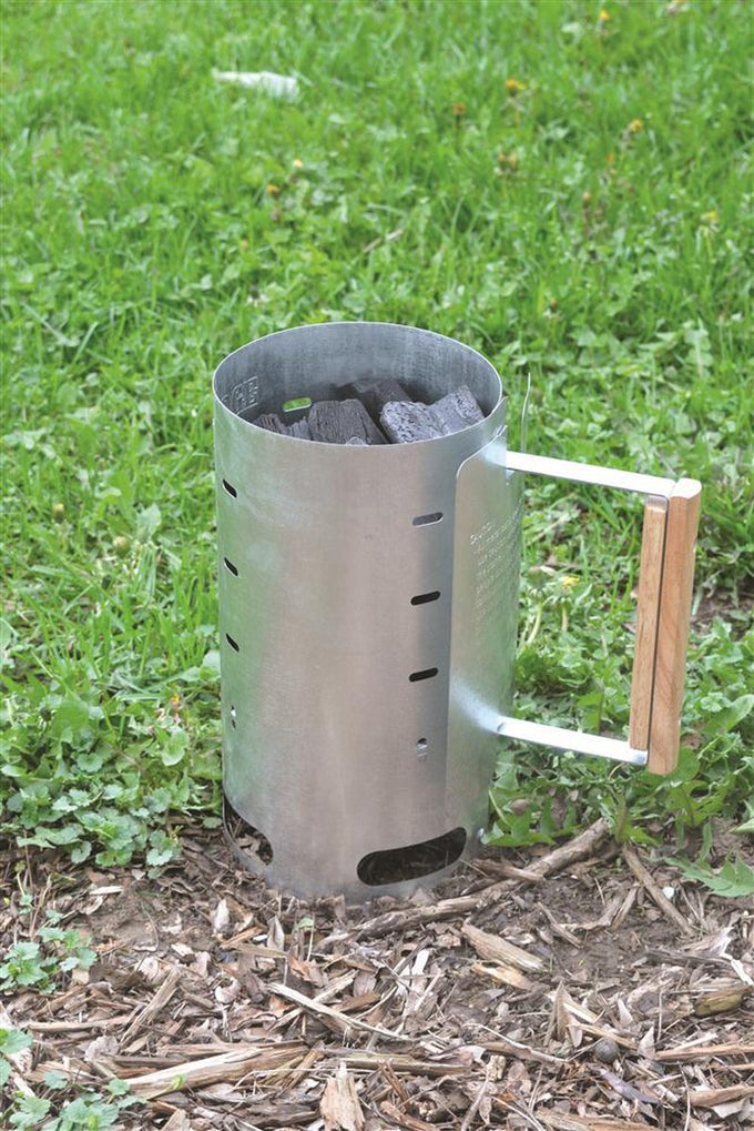 Aluminized steel charcoal starter with wooden handle filled with briquets, designed for quick charcoal ignition, ideal for camping, farm, garden, and outdoor tool collections.