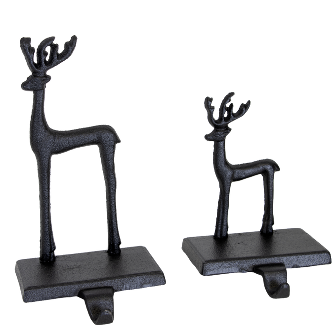 Pair of handcrafted black iron deer stocking holders in two sizes with sturdy bases and hooks, designed for Home & Decor, Holiday Decor, Best Sellers, and Promo Eligible collections.